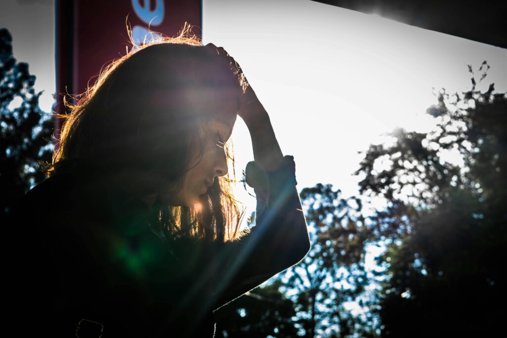 woman looking sad while outside