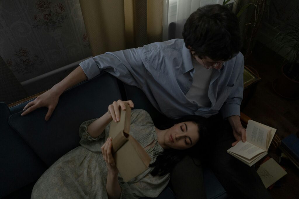 woman and man reading a book