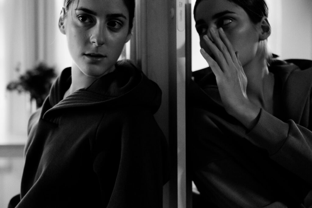 black and white image of someone talking