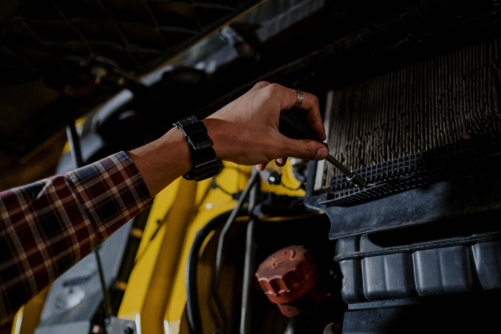 man changing car filter