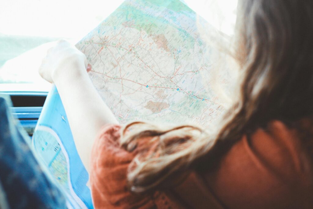 woman using paper map