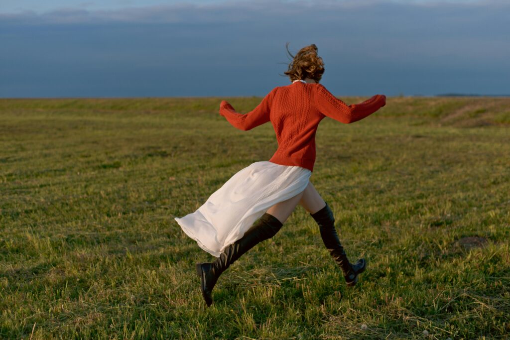 woman running in fiield