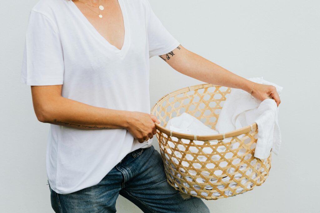 woman carrying storage basket