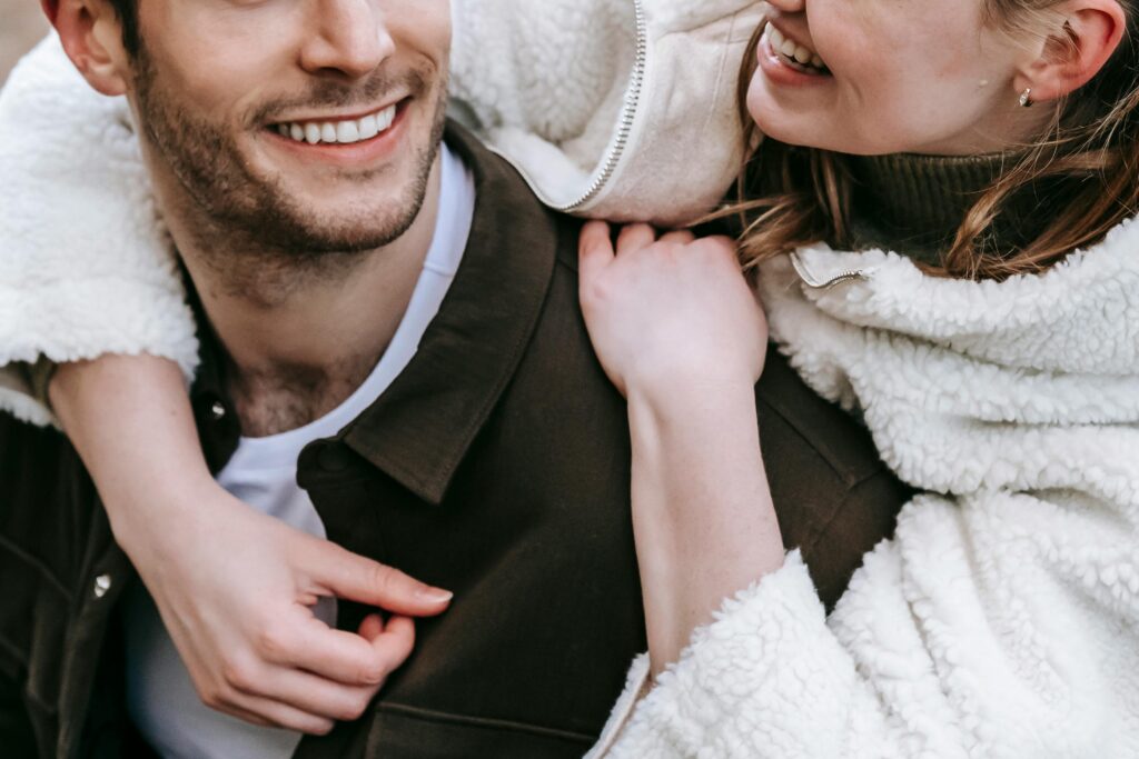 smiling couple hugging