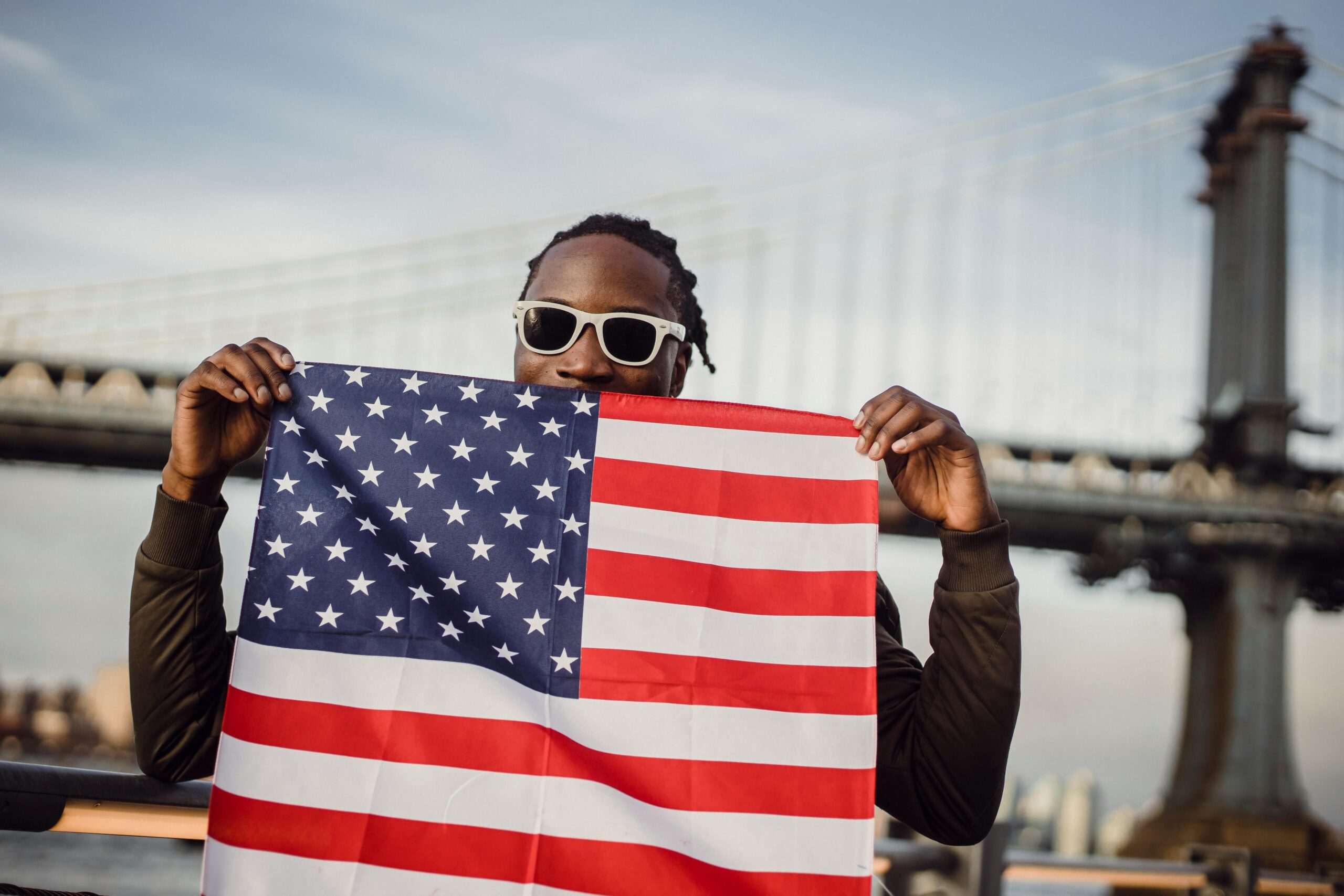 Friendly man with US flag kerchief in hands