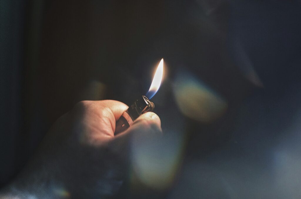hand holding a lighter