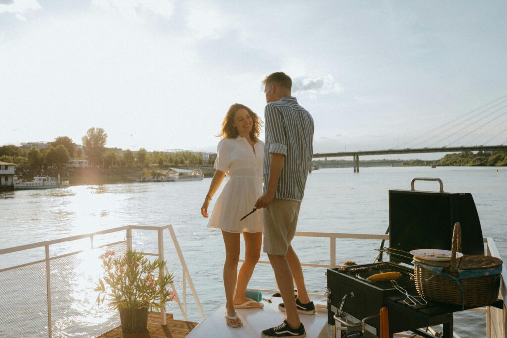 man and woman near water
