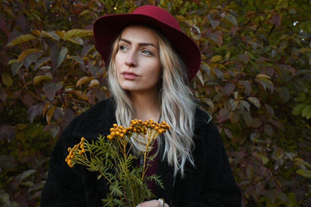 woman wearing red hat