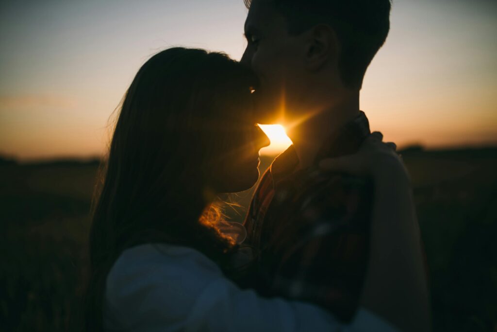 couple posing at sunset