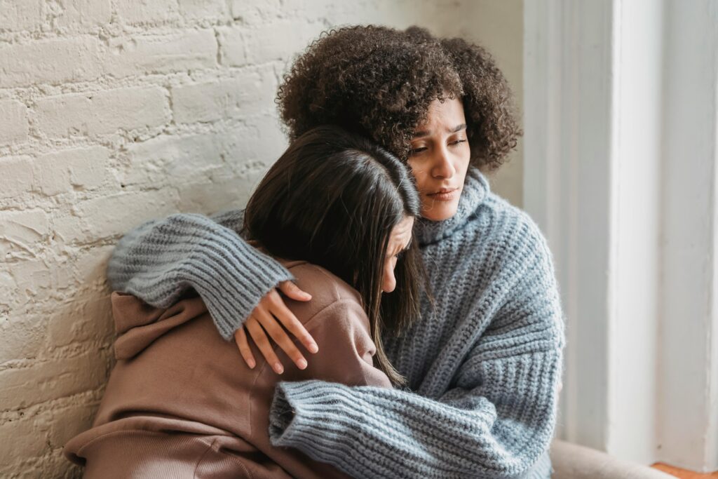 two women hugging