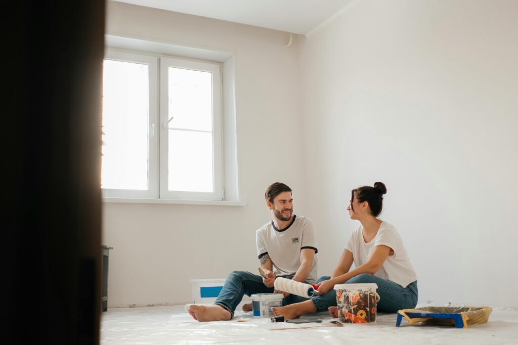 man and woman painting