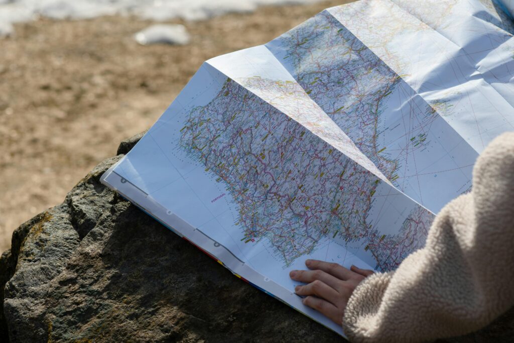 A Woman Looking at a World Map
