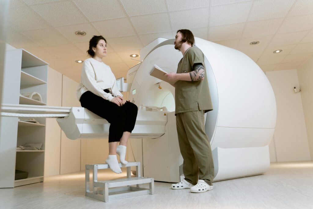 woman at CT scan machine