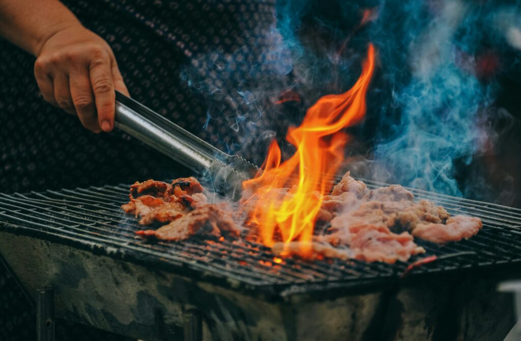 man Barbecue meat
