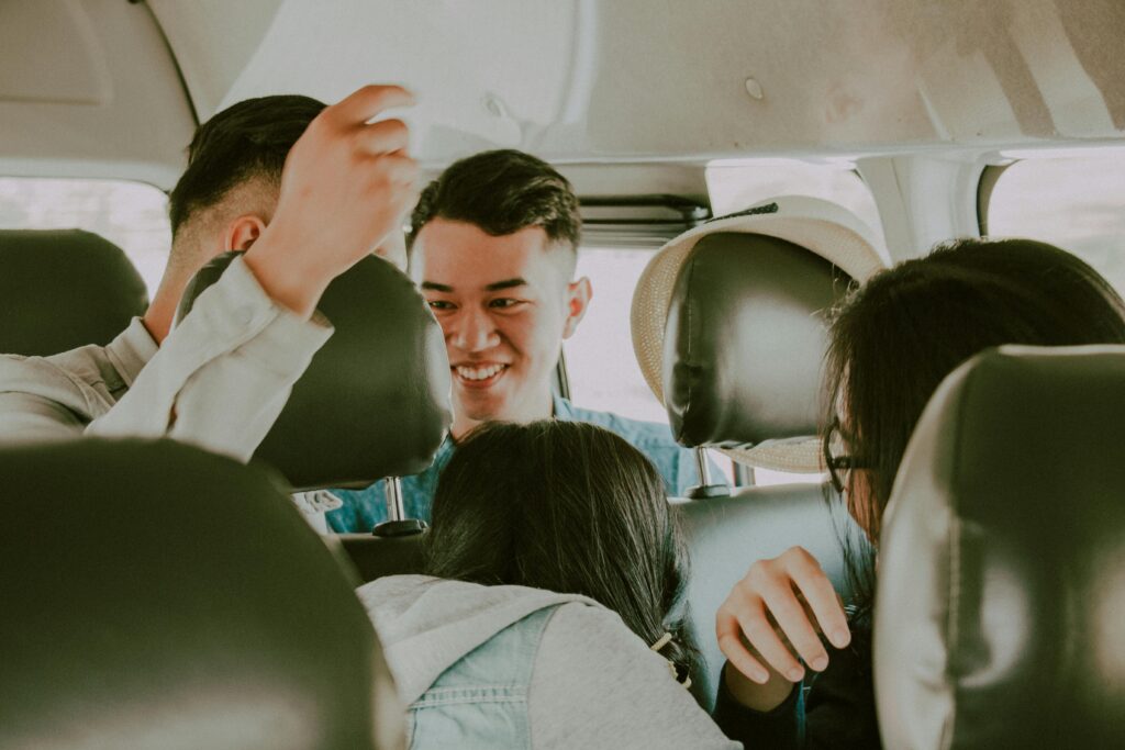 group of friends in car