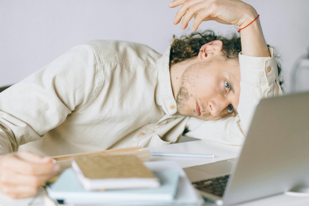 man stressed at laptop 
