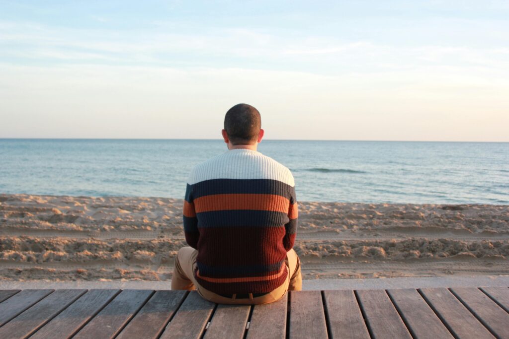 man alone at beach