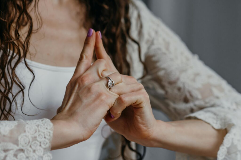 woman with hands together