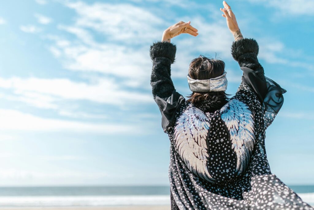 woman wearing silver coat 