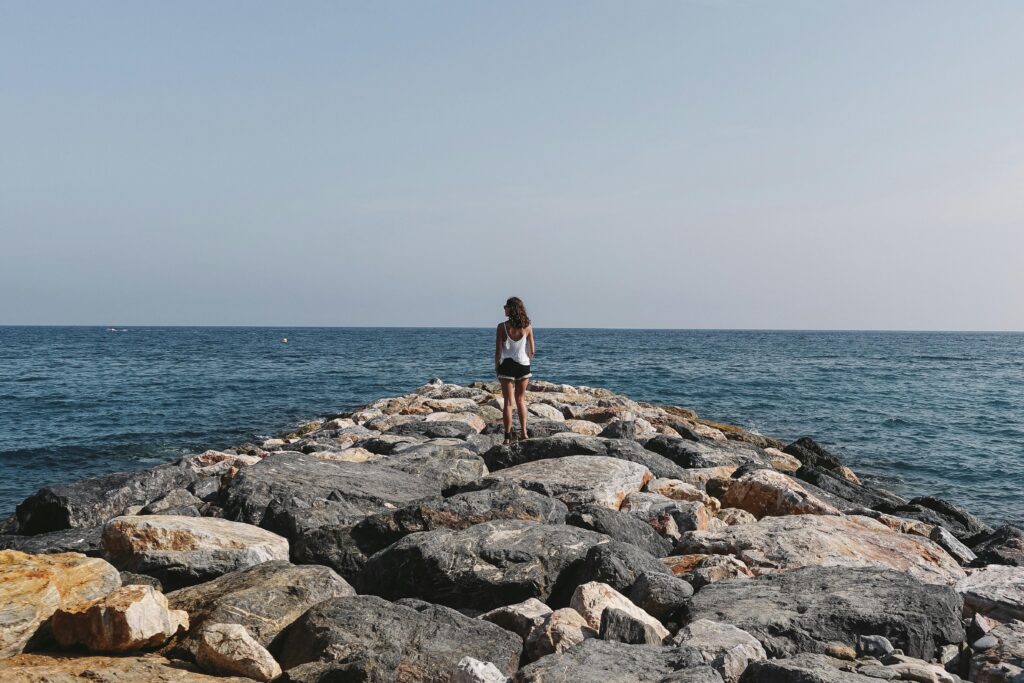 woman standing near the sea