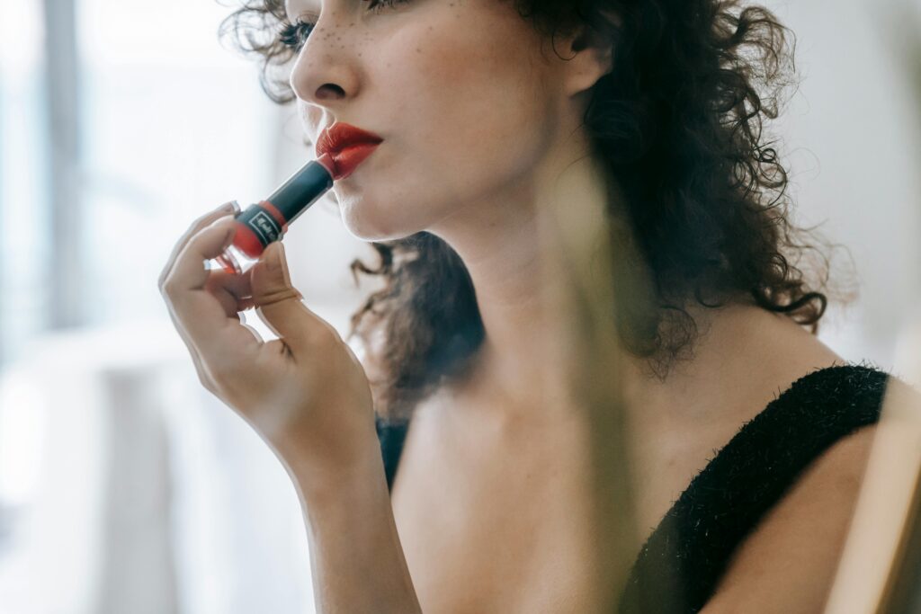woman applying makeup