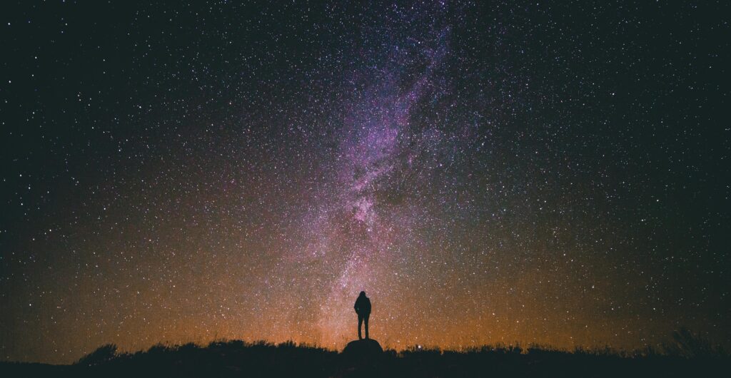 person looking at stars