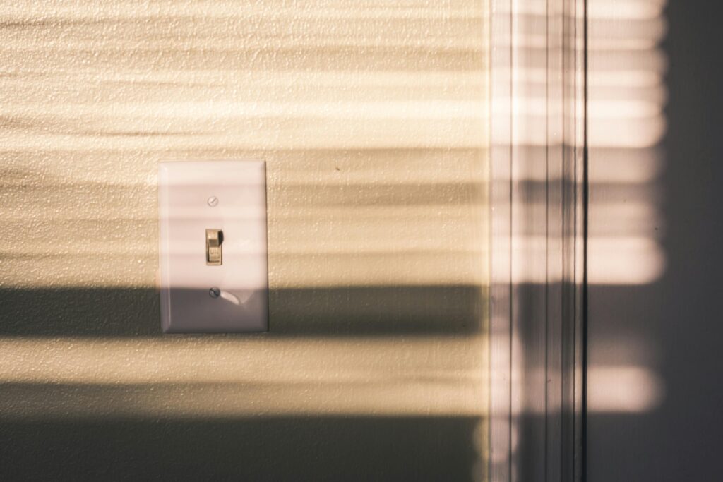 old wall light switch