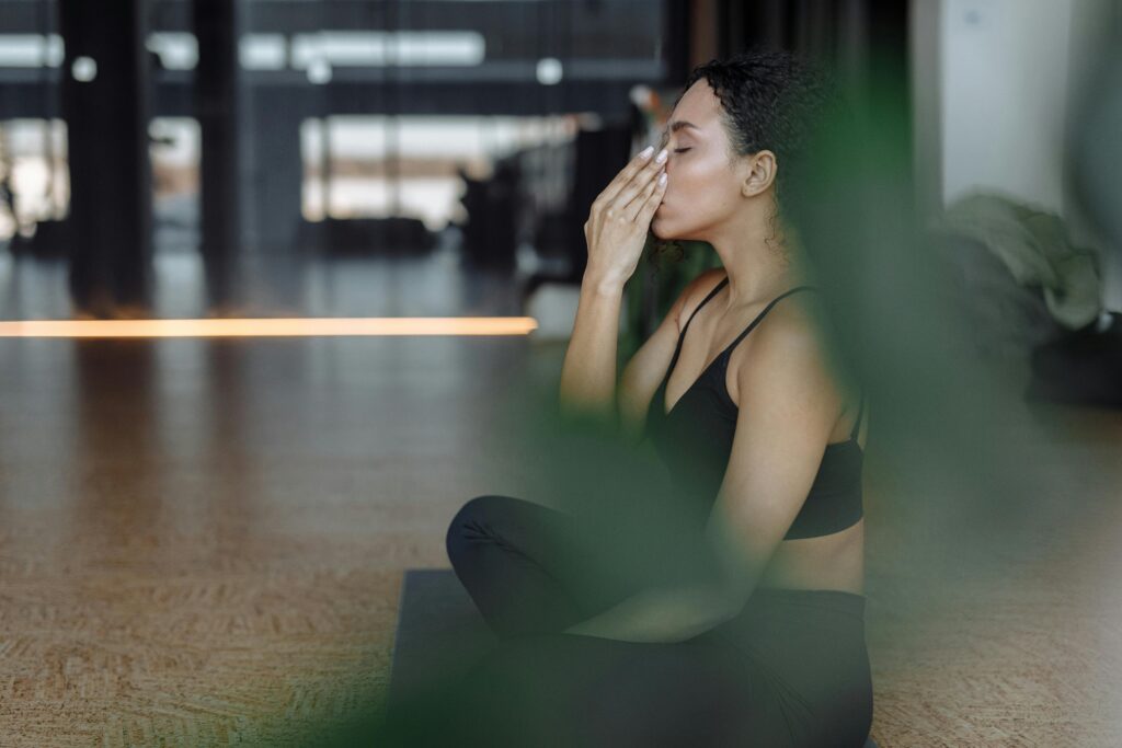woman doing breathing exercises