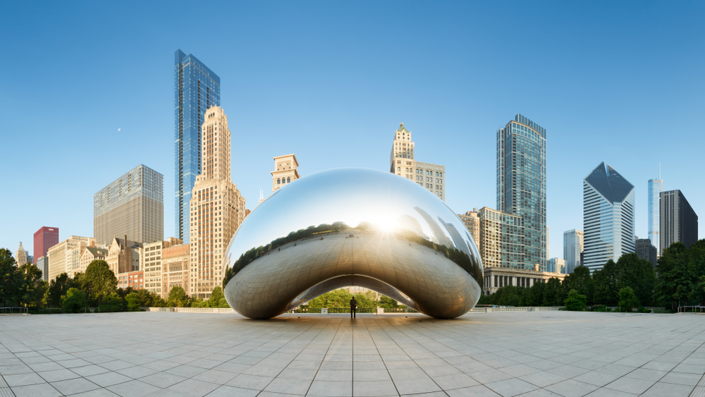 CHICAGO, ILLINOIS/USA-JUNE 30 2013: Panoramic image of the Cloud Gate or The Bean in the morning June 30 2013 in Millennium Park, Chicago, Illinois