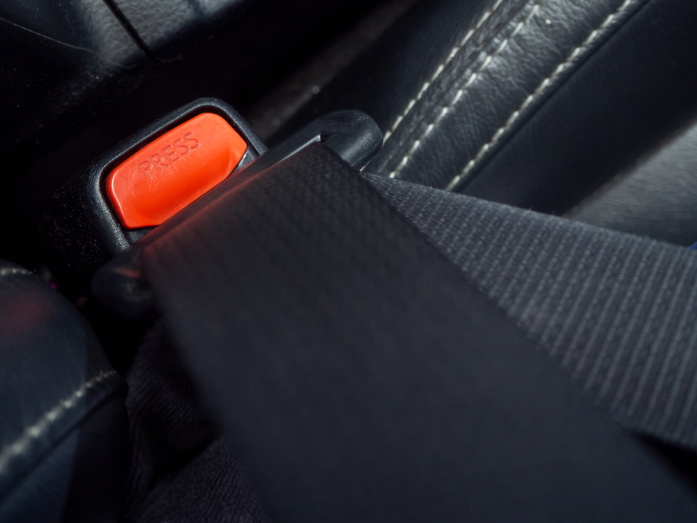Seat belt on black car seat