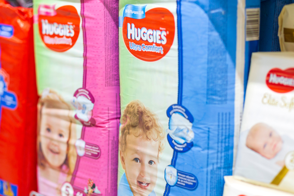 Russia Samara November 2019: Huggies diapers for children in a large chain of stores Auchan. Text in Russian: for boys