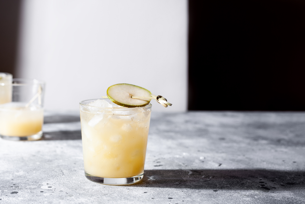 A short glass of refreshing pear soda water 