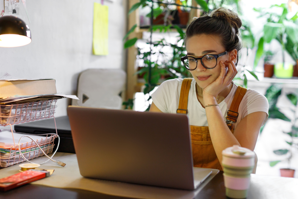 woman sitting at laptop