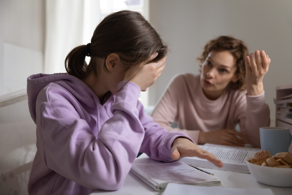 a difficult conversation with the daughter of a teenager with his father. They sit right in front of the camera and talk and look unhappy