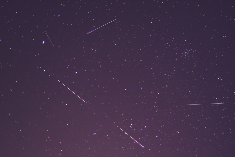 Lyrid shooting stars and Starlink stellites in the April night sky.
