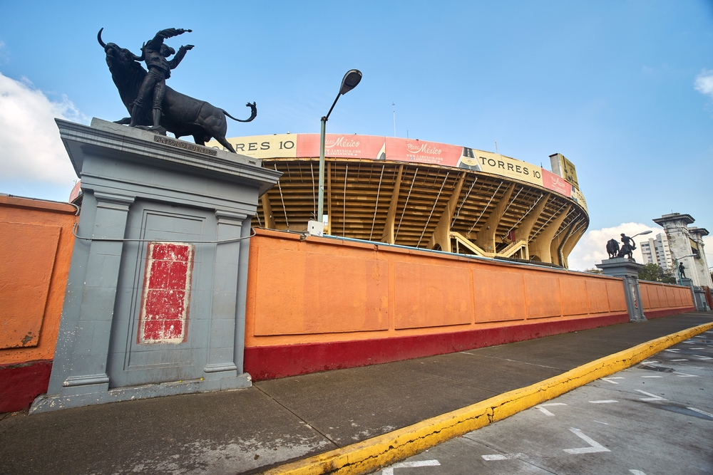 Mexico City, CDMX, Mexico 9-8-2021 The Plaza de toros Mexico facade, the world's largest bullring, empty on a sunny morning.