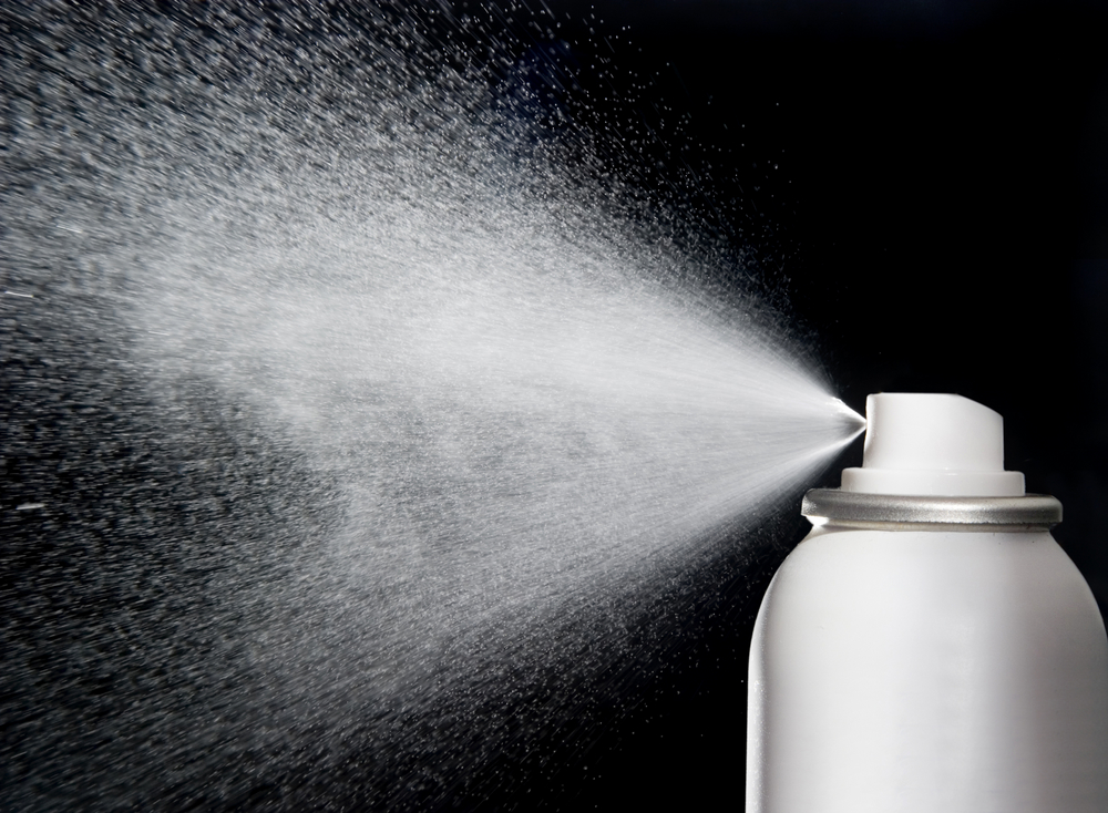 spray can with black background 