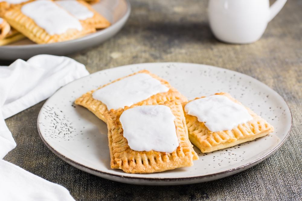 Homemade glazed pop tarts on a plate. American pastry.