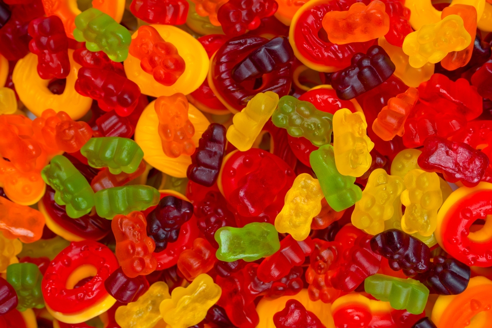 Assorted colorful gummy candies. Top view. Jelly donuts. Jelly bears. 