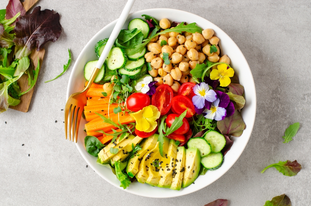 Vegan Buddha Bowl with Chickpeas, Avocado and Fresh Vegetables, Healthy Eating, Tasty Vegetarian Meal
