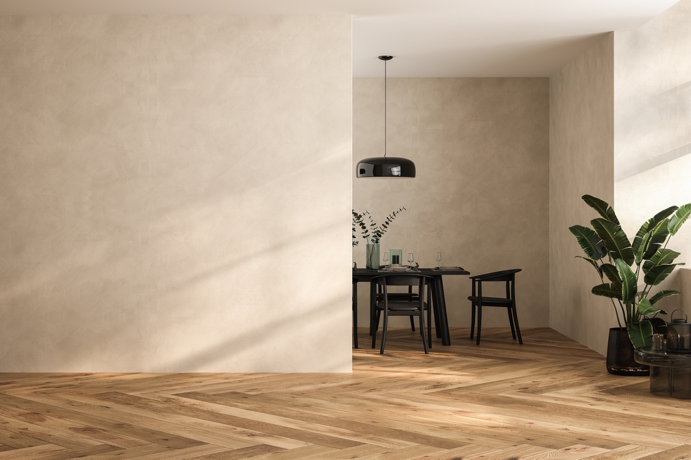 Modern interior design of apartment, dining room with table and chairs, empty living room with beige wall, panorama.
