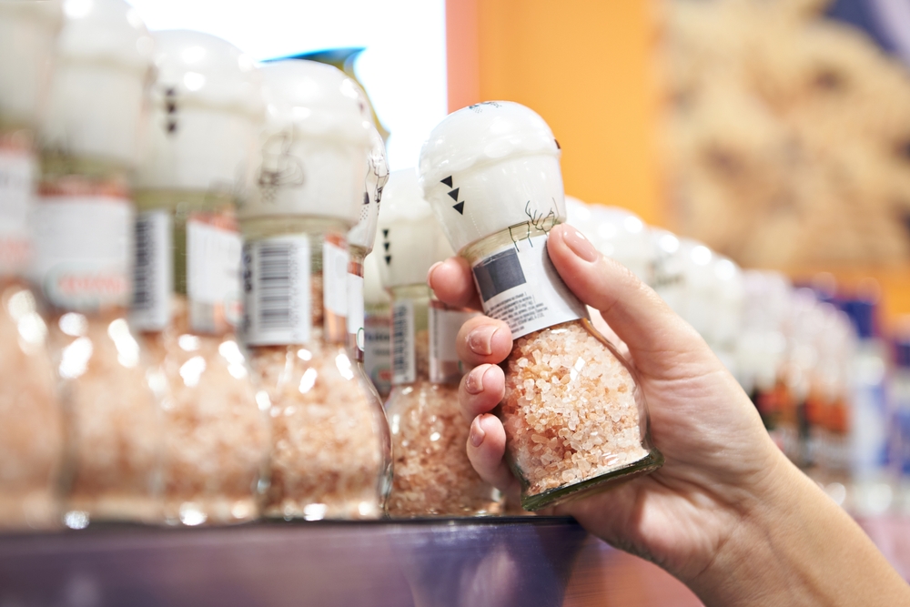 Himalayan salt in hand in store
