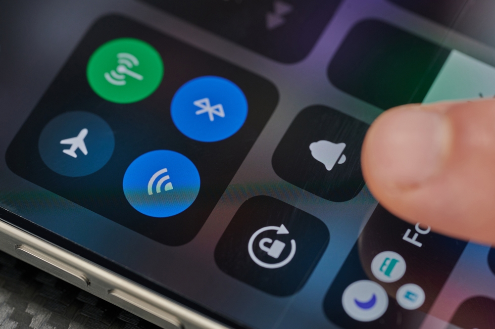New York, USA - January 24, 2024: Changing ios conrol center on apple iphone 15 pro max screen close up view
