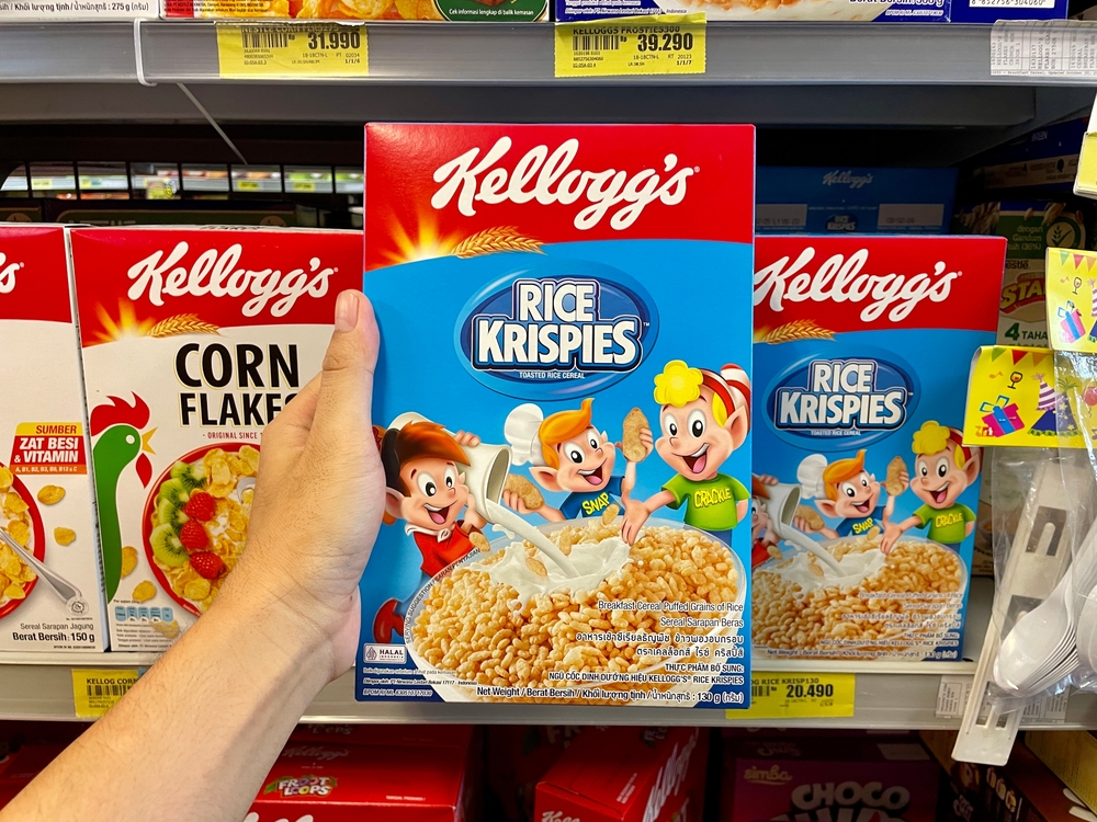Jombang, Indonesia, May 14 - 2024 : hand holding kellogs rice krispies cereal product