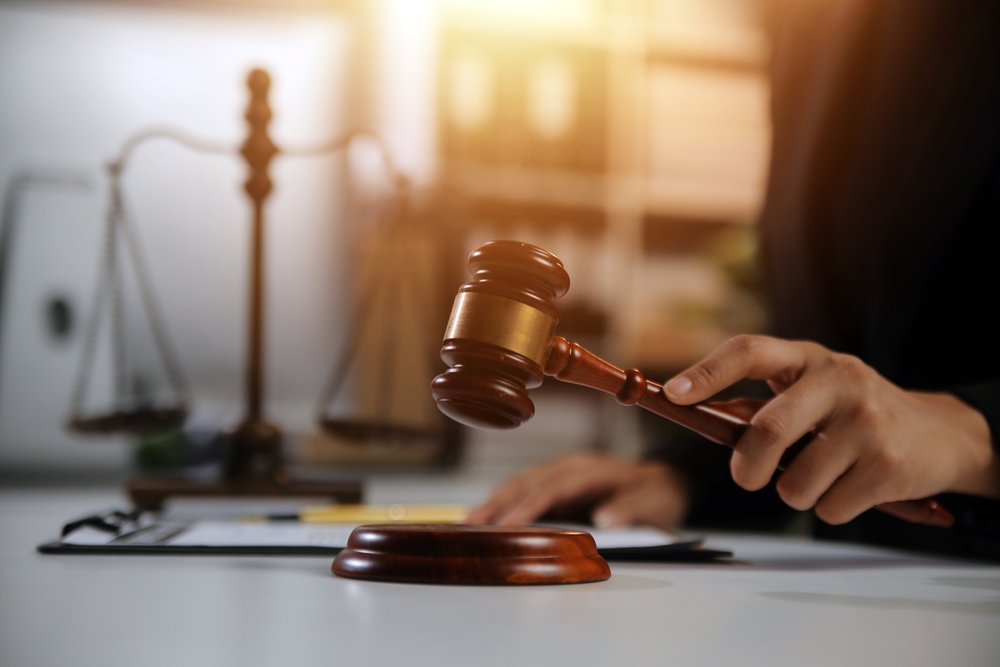 Law theme, gavel or mallet of the judge, lawyer enforcement officers, evidence-based cases taken into account in the court abount business, legislation.
