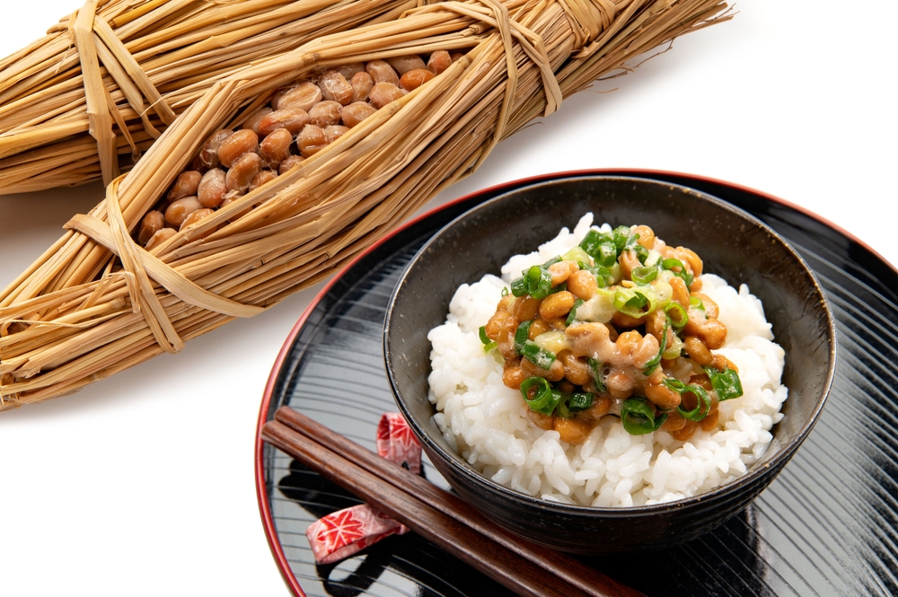 Natto rice in traditional Japanese colors on white background
