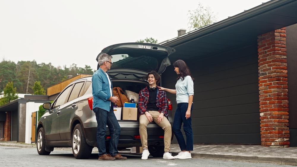 Marreid couple with son and car