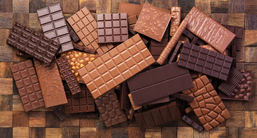collection chocolate bars, top view. tasty dessert of cocoa products