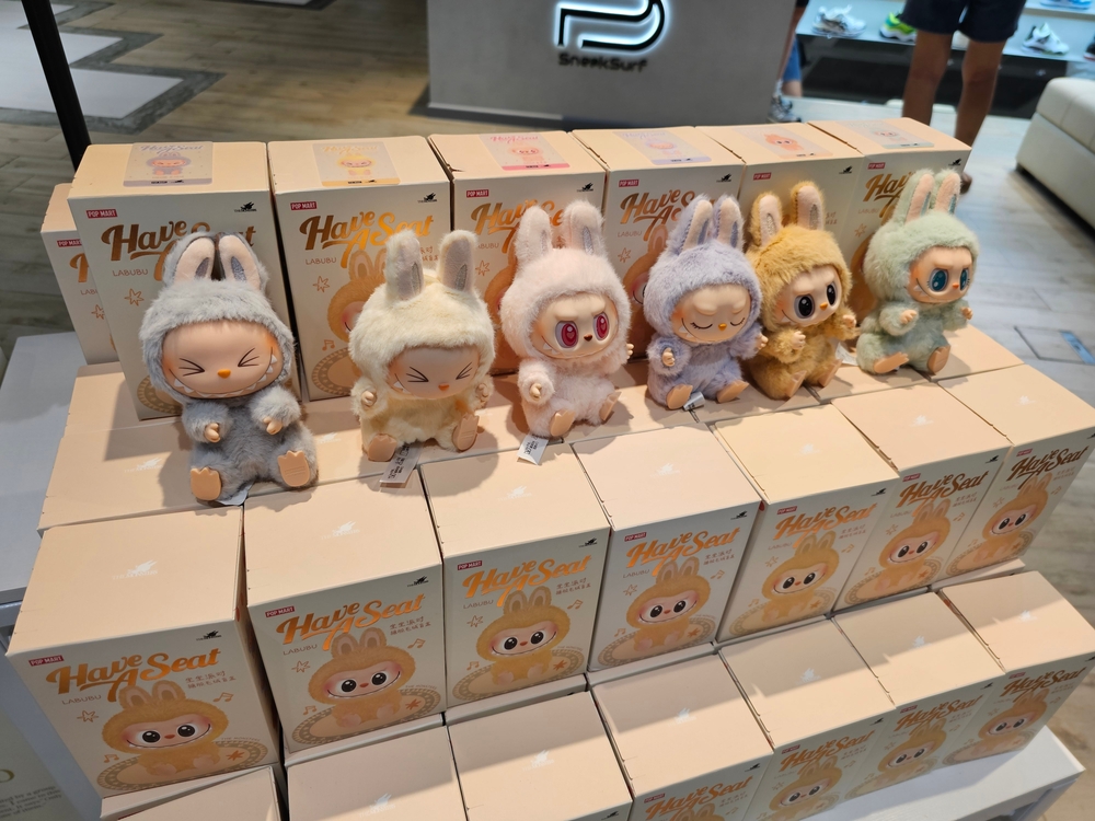 Singapore, January 22, 2025, Labubu The Monster Character of Fall In Wild Series toys figures displayed at Popmart Outlet at Funan Singapore