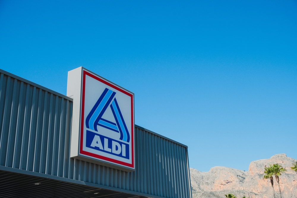 La Nucia, Spain - March 31, 2025: Aldi logo sign on store building. Aldi is global discount supermarket chain known for low prices and private-label products.